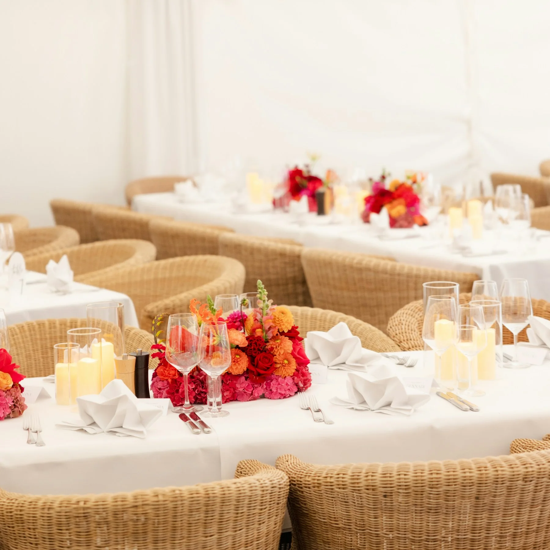 Celebration inspiration with colourful flowers, candles and elegant table settings